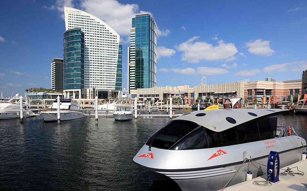 Dubai's Public Transport pictured with tramway and marina water taxi