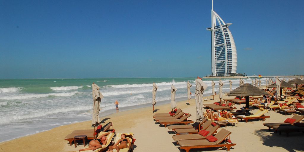 relaxed tourists enjoying Dubai landmarks